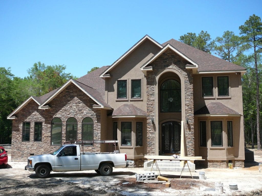 Long and luxurious, these elegant windows enhance the height of the home, making it seem even taller than it already is.